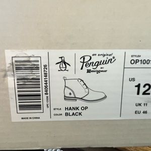 Men’s black penguin 12 dress shoes. Never worn. Black and brown sole.